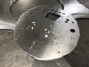 Circular aluminium sheet metal panels produced by CNC punching