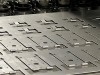 CNC punching sheet metal hinges into mild steel brackets