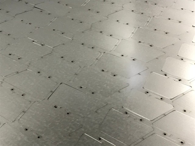 Laser cutting galvanised steel sheet metal components